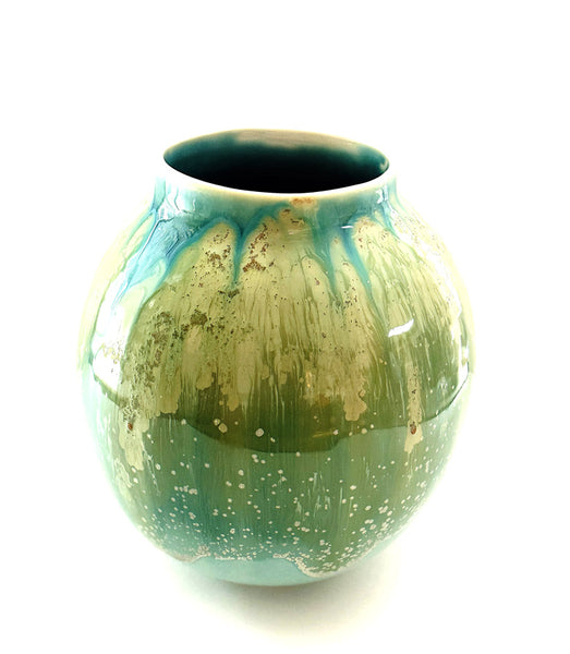 Grand vase en forme ronde tel un moonjar émaillé en turquoise avec des effets de textures et coulures tels les couleurs des vagues des eaux turquoises